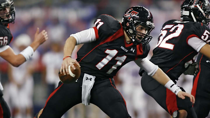 Dec 16, 2011; Arlington, TX, USA; Lake Travis quarterback Baker Mayfield (11) in the UIL 4A Division I state football championship.