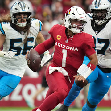 Arizona Cardinals quarterback Kyler Murray (1) scrambles out of the backfield against the Carolina Panthers at State Farm Stadium on Sept 14, 2025.