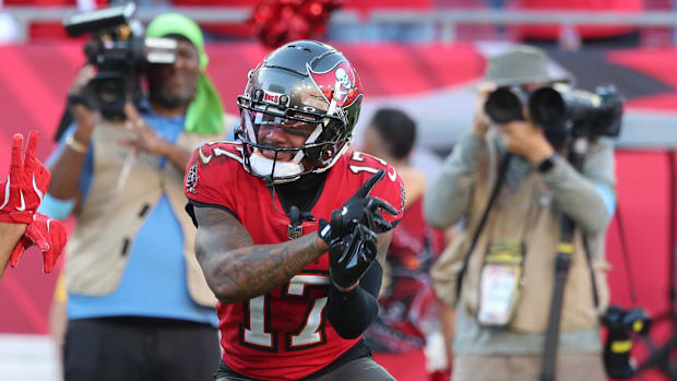 Tampa Bay Buccaneers wide receiver Jalen McMillan (15) celebrates with wide receiver Sterling Shepard (17) 