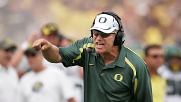 Oregon coach Mike Bellotti shares a few words with the officials during the game against Michigan in 2007. Ducks won, 39-7.