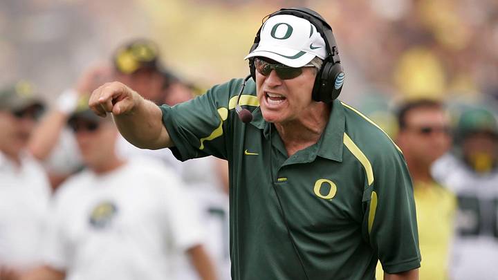 Oregon coach Mike Bellotti shares a few words with the officials during the game against Michigan in 2007.