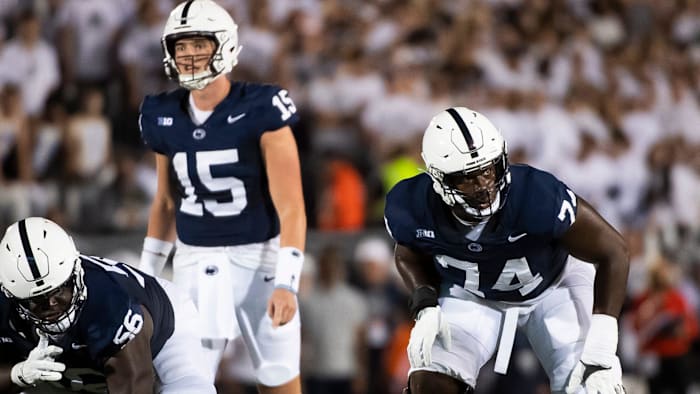 Penn State left tackle Olu Fashanu (74) gets set before a play against West Virginia at Beaver