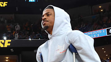 Apr 26, 2025; Memphis, Tennessee, USA; Memphis Grizzlies guard Ja Morant (12) looks on during a time out during the fourth quarter against the Oklahoma City Thunder during game four for the first round of the 2024 NBA Playoffs at FedExForum. Mandatory Credit: Petre Thomas-Imagn Images