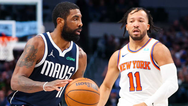 Dallas Mavericks guard Kyrie Irving and New York Knicks guard Jalen Brunso