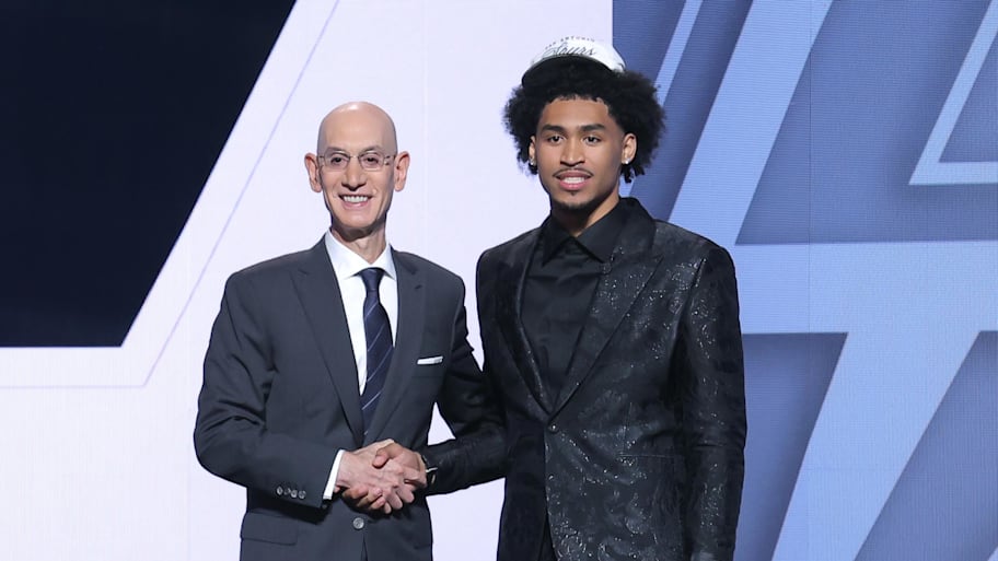 Harper stands with NBA commissioner Silver after being selected as the second pick by the San Antonio Spurs in the first round of the 2025 NBA Draft at Barclays Center.  | Brad Penner-Imagn Images