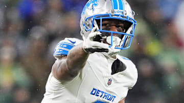 Nov 3, 2024; Green Bay, Wisconsin, USA;  Detroit Lions wide receiver Allen Robinson II (8) celebrates after earning a first down during the second quarter against the Green Bay Packers at Lambeau Field. Mandatory Credit: Jeff Hanisch-Imagn Images