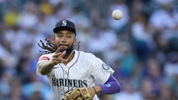Seattle Mariners shortstop J.P. Crawford (3) throws out Pittsburgh Pirates third baseman Ke'Bryan Hayes (13) at first during the third inning at T-Mobile Park on July 5. 