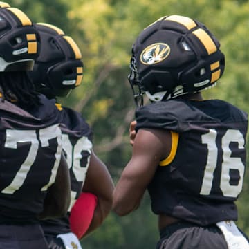 Aug 6, 2025; Columbia, MO, USA; Missouri Tigers running back Anthony Favrow (31), running back Tavorus Jones (22), Marquise Davis (77) line up.