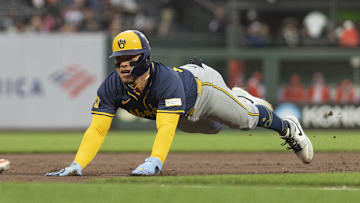 Sep 10, 2024; San Francisco, California, USA;  Milwaukee Brewers catcher William Contreras (24) dives towards third base during the first inning against the San Francisco Giants at Oracle Park. Mandatory Credit: Stan Szeto-Imagn Images