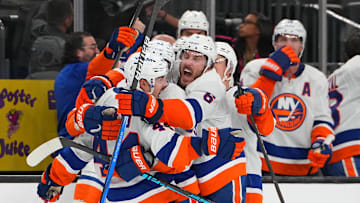 Nov 13, 2025; Las Vegas, Nevada, USA; New York Islanders center Jean-Gabriel Pageau (44) celebrates with team mates after scoring a short-handed goal against the Vegas Golden Knights during an overtime period to give the Islanders a 4-3 victory at T-Mobile Arena. Mandatory Credit: Stephen R. Sylvanie-Imagn Images