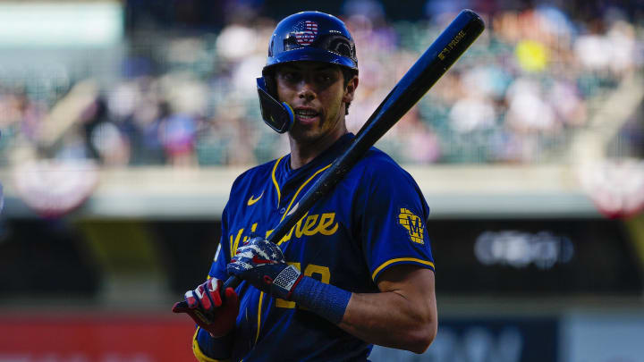 Jul 4, 2024; Denver, Colorado, USA; Milwaukee Brewers left fielder Christian Yelich (22) wears 4th of July colors against the Colorado Rockies during the first inning at Coors Field. Mandatory Credit: Troy Babbitt-USA TODAY Sports

 