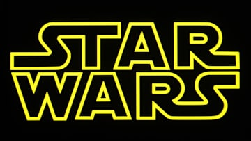 In this photo illustration, a Star Wars logo is seen on a...
