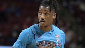 Feb 19, 2025; Tallahassee, Florida, USA; Florida State Seminoles forward Jamir Watkins (1) reacts after missing a shot during the first half against the Miami Hurricanes at Donald L. Tucker Center. Mandatory Credit: Melina Myers-Imagn Images