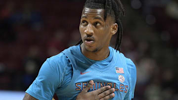 Feb 19, 2025; Tallahassee, Florida, USA; Florida State Seminoles forward Jamir Watkins (1) reacts after missing a shot during the first half against the Miami Hurricanes at Donald L. Tucker Center. Mandatory Credit: Melina Myers-Imagn Images