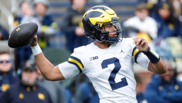 Maize Team quarterbacks Jadyn Davis makes a pass against Blue Team during the first half of spring game at Michigan Stadium in Ann Arbor on Saturday, April 20, 2024.