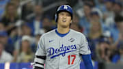 Oct 25, 2025; Toronto, Ontario, CAN; Los Angeles Dodgers two-way player Shohei Ohtani (17) reacts after fouling a ball off of his foot in the eighth inning during game two of the 2025 MLB World Series at Rogers Centre. Mandatory Credit: John E. Sokolowski-Imagn Images