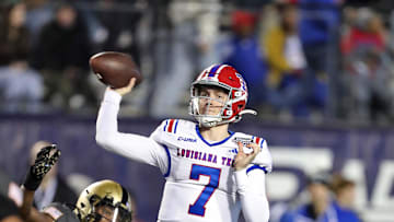 Dec 28, 2024; Shreveport, LA, USA; Louisiana Tech Bulldogs quarterback Evan Bullock (7) throws a pass against the Army Black Knights during the second half of the Radiance Technologies Independence Bowl at Independence Stadium. Mandatory Credit: Danny Wild-Imagn Images