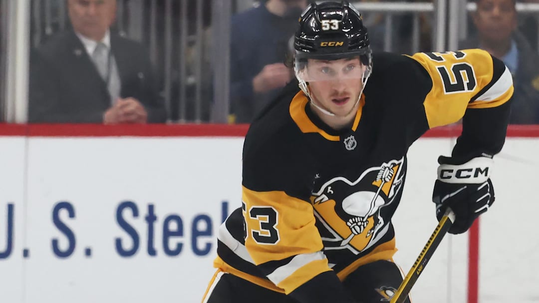 Mar 21, 2025; Pittsburgh, Pennsylvania, USA;  Pittsburgh Penguins center Philip Tomasino (53) skates up ice with the puck against the Columbus Blue Jackets during the third period at PPG Paints Arena. Mandatory Credit: Charles LeClaire-Imagn Images