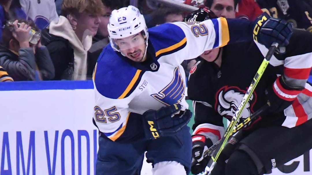 Nov 23, 2022; Buffalo, New York, USA; St. Louis Blues center Jordan Kyrou (25)brings the puck up the ice against the Buffalo Sabres in the first period at KeyBank Center. Mandatory Credit: Mark Konezny-Imagn Images