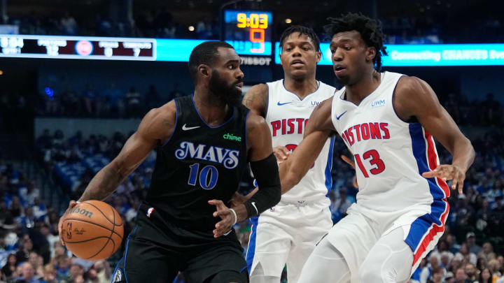 Apr 12, 2024; Dallas, Texas, USA; Dallas Mavericks forward Tim Hardaway Jr. (10) looks to pass against Detroit Pistons center James Wiseman (13) during the first half at American Airlines Center. Mandatory Credit: Chris Jones-USA TODAY Sports