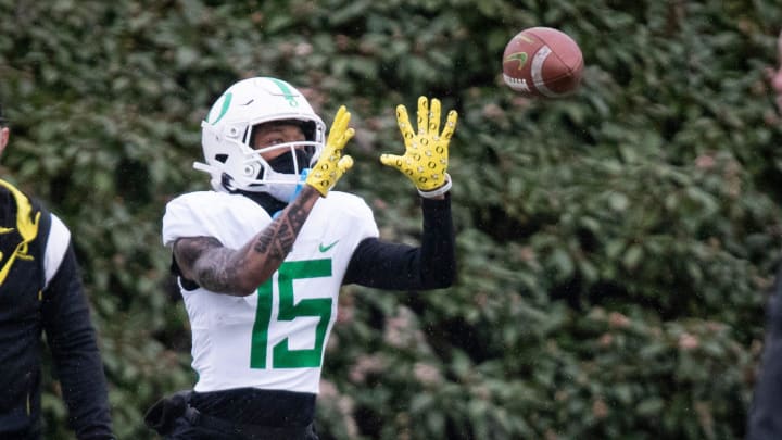 Oregon wide receiver Tez Johnson catches a pass during practice with the Oregon Ducks Thursday, April 4, 2024, at the Hatfield-Dowlin Complex in Eugene, Ore.