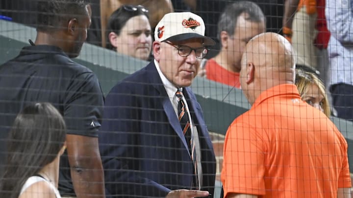 Jul 30, 2024; Baltimore, Maryland, USA;  Baltimore Orioles majority owner David Rubenstein speaks with Cal Ripken behind home plate during the game against the Toronto Blue Jays at Oriole Park at Camden Yards.