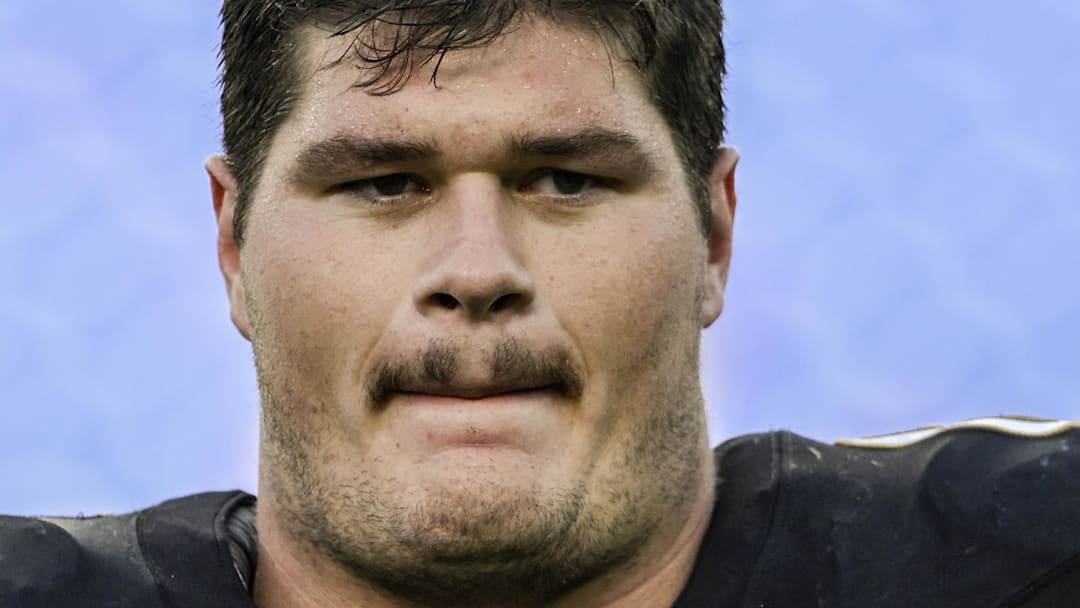 Oct 26, 2025; Baltimore, Maryland, USA;  Baltimore Ravens center Tyler Linderbaum (64) on the field after the game against the Chicago Bears at M&T Bank Stadium. Mandatory Credit: Tommy Gilligan-Imagn Images