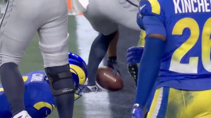 Zach Charbonnet's commitment to picking up footballs paid off for the Seattle Seahawks.