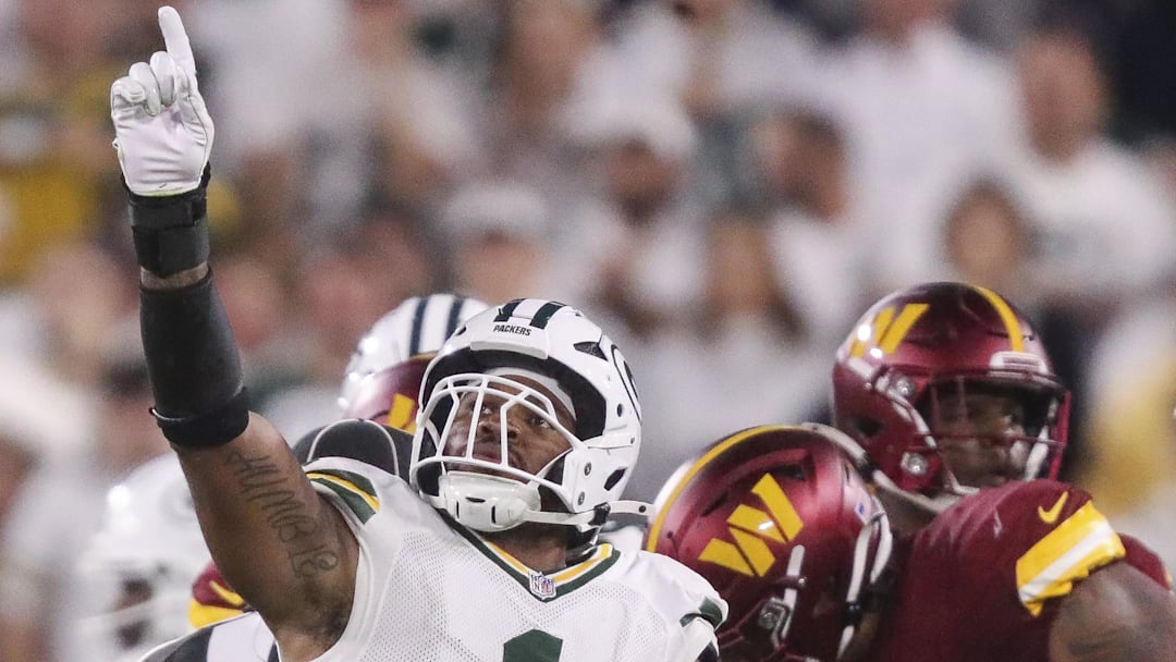 Sep 11, 2025; Green Bay, Wisconsin, USA; Green Bay Packers defensive end Micah Parsons (1) celebrates after sacking Washington Commanders quarterback Jayden Daniels at Lambeau Field. Mandatory Credit: Tork Mason-USA TODAY Network via Imagn Images