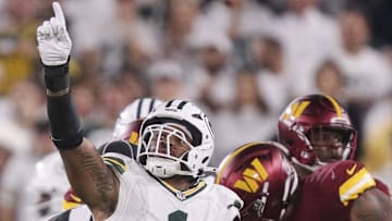 Sep 11, 2025; Green Bay, Wisconsin, USA; Green Bay Packers defensive end Micah Parsons (1) celebrates after sacking Washington Commanders quarterback Jayden Daniels at Lambeau Field. Mandatory Credit: Tork Mason-USA TODAY Network via Imagn Images