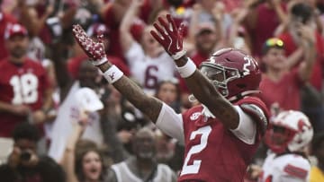 Aug 31, 2024; Tuscaloosa, Alabama, USA; Alabama Crimson Tide wide receiver Ryan Williams (2) celebrates after scoring a touchdown against the Western Kentucky Hilltoppers during the first half at Bryant-Denny Stadium.  Mandatory Credit: Gary Cosby Jr.-USA TODAY Sports