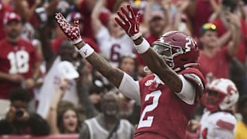 Aug 31, 2024; Tuscaloosa, Alabama, USA; Alabama Crimson Tide wide receiver Ryan Williams (2) celebrates after scoring a touchdown against the Western Kentucky Hilltoppers during the first half at Bryant-Denny Stadium.  Mandatory Credit: Gary Cosby Jr.-Imagn Images