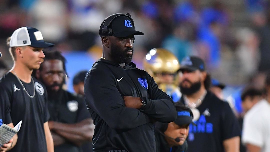 Aug 30, 2025; Pasadena, California, USA; UCLA Bruins head coach DeShaun Foster watches game action against the Utah Utes during the second half at Rose Bowl. Mandatory Credit: Gary A. Vasquez-Imagn Images