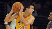 Dec 29, 2011; Los Angeles, CA, USA; Los Angeles Lakers forward Jason Kapono (28) is defended by New York Knicks forward Bill Walker (5) at the Staples Center. The Lakers defeated the Knicks 99-82. Mandatory Credit: Kirby Lee/Image of Sport-Imagn Images