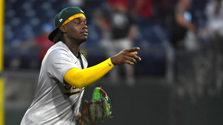 Jul 14, 2024; Philadelphia, Pennsylvania, USA; Oakland Athletics outfielder Lawrence Butler (4) celebrates win against the Philadelphia Phillies at Citizens Bank Park. Mandatory Credit: Eric Hartline-USA TODAY Sports