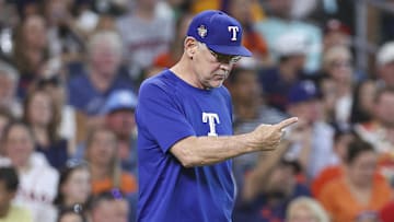Jul 14, 2024; Houston, Texas, USA; Texas Rangers manager Bruce Bochy motions for a pitching change during the fifth inning against the Houston Astros at Minute Maid Park. Mandatory Credit: Troy Taormina-Imagn Images
