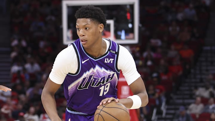 Oct 8, 2025; Houston, Texas, USA; /Utah Jazz forward Ace Bailey (19) dribbles the ball as Houston Rockets forward Jabari Smith Jr. (10) defends during the second quarter at Toyota Center. Mandatory Credit: Troy Taormina-Imagn Images