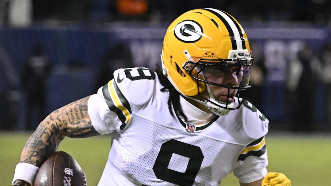 Green Bay Packers receiver Christian Watson (9) runs after the catch against the Chicago Bears during the wild-card game.