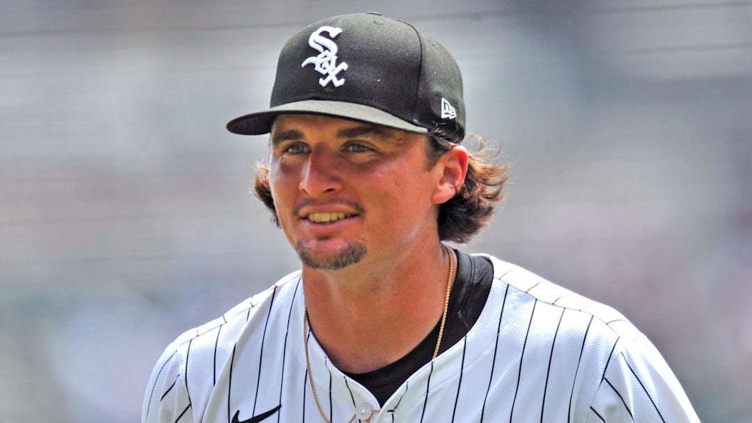 Chicago White Sox starting pitcher Davis Martin (65) smiles after ending the first inning against the Cleveland Guardians at Rate Field. 