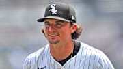 Chicago White Sox starting pitcher Davis Martin (65) smiles after ending the first inning against the Cleveland Guardians at Rate Field. 