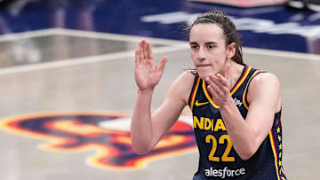 Indiana Fever guard Caitlin Clark (22) claps her hands in excitement Sunday, July 13, 2025, during the game at Gainbridge Fieldhouse in Indianapolis.