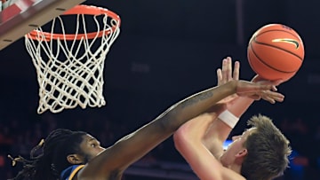 Morehead State Eagles center Tamaury Releford (24) defends the shot of Clemson Tigers forward Jake Wahlin (10) Tuesday, Nov. 11, 2025, during the NCAA men’s basketball game at Littlejohn Coliseum in Clemson, South Carolina.