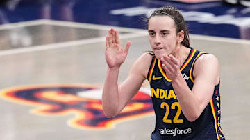 Indiana Fever guard Caitlin Clark (22) claps her hands in excitement Sunday, July 13, 2025, during the game at Gainbridge Fieldhouse in Indianapolis.