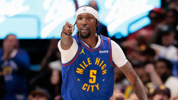 Apr 20, 2024; Denver, Colorado, USA; Denver Nuggets guard Kentavious Caldwell-Pope (5) reacts to a three point shot during the third quarter against the Los Angeles Lakers in game one of the first round for the 2024 NBA playoffs at Ball Arena. Mandatory Credit: Andrew Wevers-USA TODAY Sports