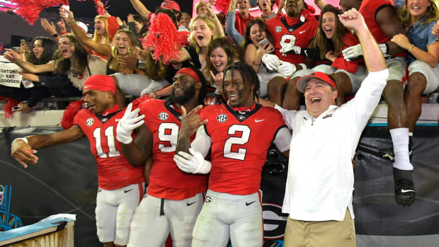 Kirby Smart and the Georgia Bulldogs celebrate after beating Florida in 2023.