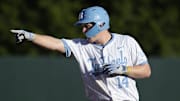 North Carolina Tar Heels Parks Harber (14) reacts to hitting a double against the West Virginia Mountaineers in the third inning of the DI Baseball Super Regional at Boshamer Stadium. 