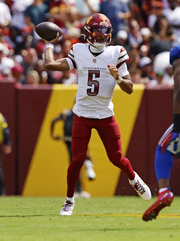 Washington Commanders quarterback Jayden Daniels (5).