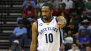 Memphis, TN, USA;  Memphis Grizzlies point guard Gilbert Arenas (10) dribbles the ball up the court during the second half against the Golden State Warriors at the FedEx Forum. Mandatory Credit:
