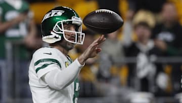 Oct 20, 2024; Pittsburgh, Pennsylvania, USA;  New York Jets quarterback Aaron Rodgers (8) warms up before the game against the Pittsburgh Steelers at Acrisure Stadium. Mandatory Credit: Charles LeClaire-Imagn Images