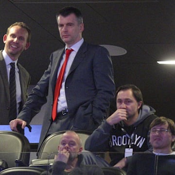 Feb 19, 2016; Brooklyn, NY, USA; Brooklyn Nets new general manager Sean Marks (left) in a suite with team owner Mikhail Prokhorov during the first quarter against the New York Knicks at Barclays Center. Mandatory Credit: Brad Penner-Imagn Images